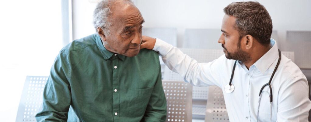 Doctor talks with patient